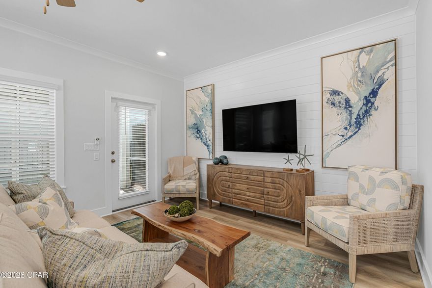 NO RENTAL RESTRICTIONS!!! Our stunning pool is NOW OPEN! The prefect place to SOAK UP THAT Florida SUN! Seagate at Clara is a new townhome community nestled in the vibrant city of Panama City Beach, FL. This two-story unit features board and batten exterior and covered entries. One car garage provides a great space for storing beach essentials. This open concept townhome boasts a stylish kitchen with white cabinets, tile backsplash, a large island with quartz counter tops - perfect for entertaining.  The elegant Owners Suite is designed with comfort in mind showcasing a large walk in closet and double- bowl vanities. Main Bath has tiled shower.  All bathrooms have quartz countertops.  LVP is located throughout the home.  The community pool features a cabana, lounging, seating and grilling stations. This community has a dedicated dog park. Seagate at Clara is in a prime location, approximately 1.4 miles to the sandy beaches and just minutes from Pier Park.