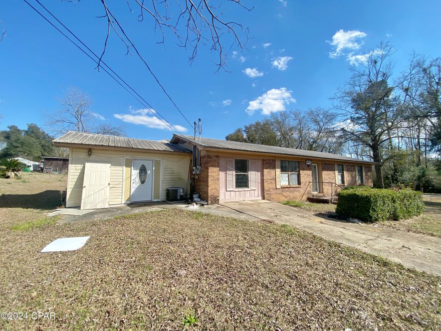 Discover a rare opportunity in real estate with this meticulously converted house featuring two separate units.  This property is offered BELOW MARKET VALUE to accommodate necessary updates and ensure compliance with proper building codes.

The main residence offers a very functional layout with 3 bedrooms, 1 full bathroom, an indoor laundry area, and a welcoming living room. The well-appointed kitchen with dining space creates a central hub for gatherings and daily life. Adjacent to the main house, the second unit boasts a separate entry, combining a living and dining area, a fully-equipped updated kitchen, an indoor laundry area, a full bathroom, and 2 bedrooms. An additional flex space, ideal for an office or hobby room, adds to the unit's versatility.

To enhance functionality and compliance, the property requires some essential updates. Electrical meters need to be added to both units for individualized usage tracking.  (no electricity is currently hooked up to the property) A firewall is needed between the units to ensure safety and privacy, while separating the plumbing systems will add convenience and meet regulatory standards.

Recognizing the need for these updates, the seller has strategically priced the property below market value. This creates an extraordinary opportunity for buyers looking to invest in a property with substantial potential. Whether you're a homeowner seeking additional income through rental opportunities or an investor with an eye for unlocking value, this property is a canvas for your vision.
ALL OFFERS ARE ENCOURAGED! Property sold AS IS