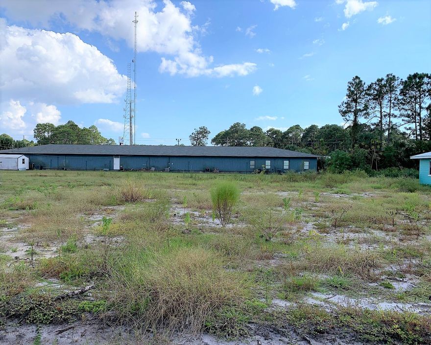 Great Investment!  This property is now zoned R3 which will alow up to a Tri-Plex / Townhomes!   All the engineering has been completed to build 3 attached townhomes/ Tri-Plex on this property, also sewer and water are  on the property.  The sale will include the complete turn key package to begin construciton to include engineered construction plans for a 4,890 heated and cooled S/F two story triplex.  Call today for more details on this great investment!