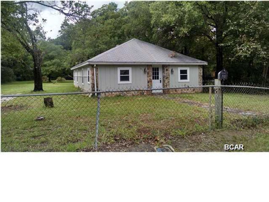 Great opportunity for an affordable home located on a very large lot, close to Tyndall AFB, schools, restaurants and shopping in Callaway. This home has an open concept with 3 bedrooms and one bath.  The entire 100x300 lot is fenced in and has plenty of room to add on or to build a shop or garage.  Come check this one out!!!