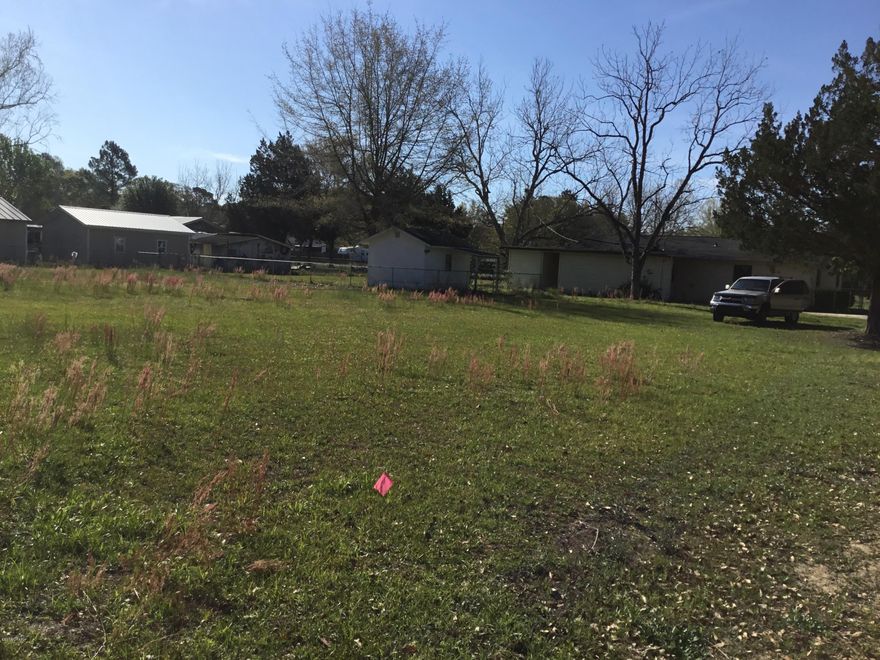 This three bedroom, two bath home located on very large corner lot, chain link fence, mature pecan trees, nice outside back deck with swing, separate workshop, near school and shopping located in Bay County near the City of Callaway. Excellent buy, priced to sell.