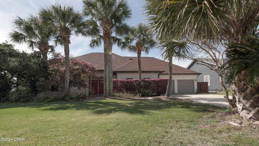 Home located in desirable Southfields Subdivision on West Panama City Beach and sports a 22,000 gallon saltwater pool, paver patio, outside shower and pool bath. The beach is just three tenths of a mile walking distance of County Public Beach Access #93. The split bedroom floor plan includes a nicely appointed kitchen that will impress the cook with stainless steel appliances, plenty of custom cabinetry and counter space, a pantry and breakfast nook.  There's a  spacious living room with natural gas fireplace and French doors,  large dining room, a bonus room with many options for use, large foyer, three bedrooms, three bathrooms, and a laundry room.  Outside you'll enjoy relaxing in the pool and gathering for outdoor meals, entertainment and activities.  There are two outside storage buildings to free up the garage for its intended purpose. The yard is nicely landscaped for curb appeal and privacy. The attic has LED lighting throughout, additional storage and is well insulated. A list of improvements is available.  Short Term Rentals Allowed for this property.  Investors don;t miss this opportunity. Buyer to confirm room measurements if important.