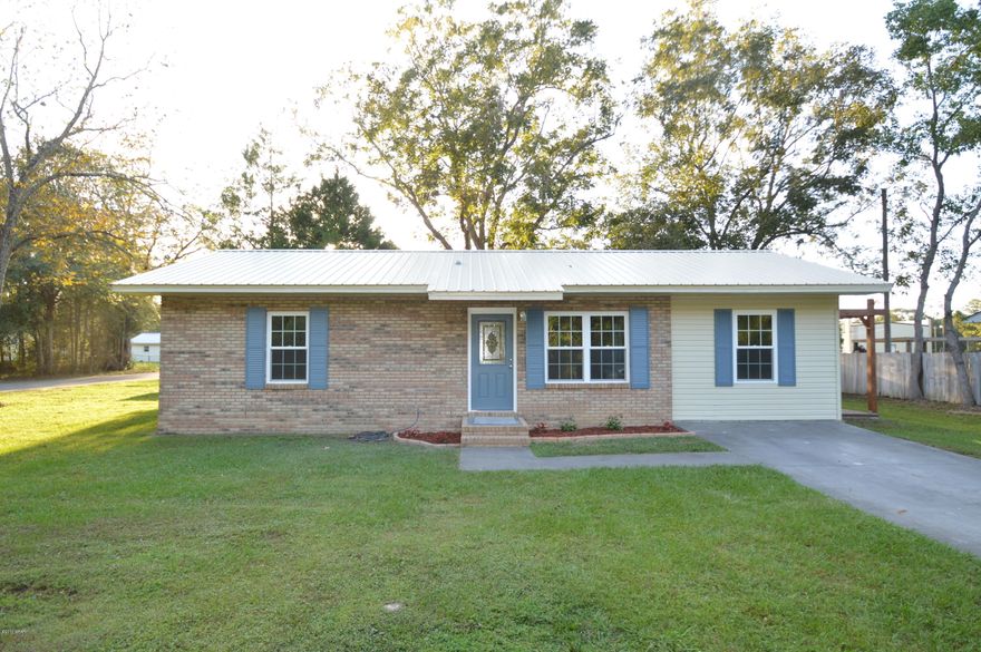 This charming 3 bedroom 2 full bath home has been completely renovated with nice finishes throughout and feels like a brand new home! The owners have spared no expense in making this home move in ready. The home features a brand new 30 year roof, new windows throughout, new carpet/vinyl flooring, new solid wood kitchen cabinets, smooth tile counter-tops, Stainless steel appliances, modern bathroom fixtures, Joanna Gaines paint pallete, and so much more. The pergola sitting area with outdoor carpet is the perfect place to enjoy the sunny Florida weather and have a barbecue with friends and family. The brick exterior is clean and timeless. The backyard is cozy, and offers a storage shed. This home is perfect for anyone that wants new finishes without the hassle of building or renovating.