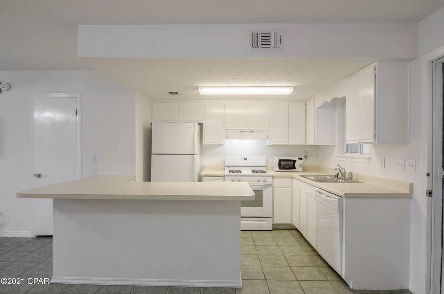 Unique 2 bedroom unit with office space and screened porch! This unit offers over 1300 sq ft of living space. Open concept floor plan with a ½ bath for guests. Just off the kitchen is a fully screened porch leading out to a patio overlooking one of the five heated pools in the complex. Unlike some other units in the complex, the laundry room is accessible from inside the home. Upstairs, you'll find 2 good sized bedrooms with large closets. Off the master is an office space or extra sleep space for guests. New roof in December 2018. New HVAC July 2018. This unit is a must see and would make a perfect beach home or a great investment property. Short term rentals are allowed. Gulf Highlands is across the street from the beach and has a private gate with crosswalk and red light to cross over F Front Beach Road to get to the private beach entrance. 
Gulf Highlands Beach Resort offers 11 swimming pools, one of which is on the gulf side with a diner/bar, and 5 of the pools are heated. Also, you'll enjoy 18 holes of putt-putt, 4 tennis courts, gym, and plenty of streets inside this gated community to walk, bicycle or ride your golf cart. The complex is pet friendly and family oriented. Walking distance to restaurants, shopping and bars.