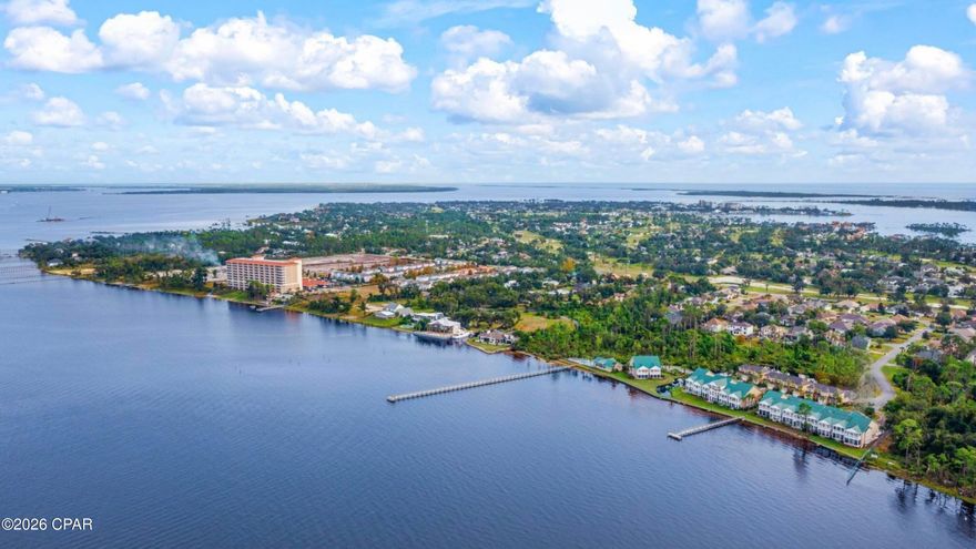 WATERFRONT TOWNHOME ON ST ANDREWS BAY!

Paradise awaits at Pelican Bay where bayfront living meets comfort, space, and stunning views. This beautifully maintained 3 bedroom, 2.5 bath townhome offers spacious living designed to capture the beauty of St Andrews Bay.

Step inside to a welcoming entry and open concept living and dining area, perfect for entertaining or relaxing after a day on the water. The space flows effortlessly to a screened patio, ideal for enjoying coastal breezes and peaceful bay views.

The spacious primary suite faces the bay and features bayfront balcony access, creating the perfect setting to enjoy breathtaking sunrise views each morning. 

This home also offers generous closet space, abundant storage, and updated flooring and paint throughout. Has been newly painted exterior as well.

Relax by the community pool, walk the pier, or launch a kayak right from the property. The community pier also offers day use boat access, making it easy to enjoy time out on the water.

Conveniently located just minutes from sugar white beaches, St Andrews State Park, golf courses, marinas, dining, and shopping at Pier Park, this home places you in the heart of everything the Emerald Coast has to offer.

Whether you are looking for a primary residence or a second home, this is bayfront living at its finest.

Wake up to the beauty of the bay. Paradise awaits you at Pelican Bay.