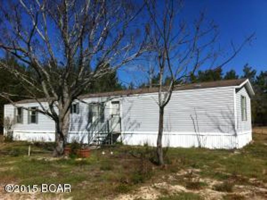 ESCAPE TO THE COUNTRY....This single wide mobile home has approximately 1.2 acres and is set back from the road for privacy. Fencing already in place. Quite and peaceful setting. Relax in the country just minutes from town. 3 BR/2BA.