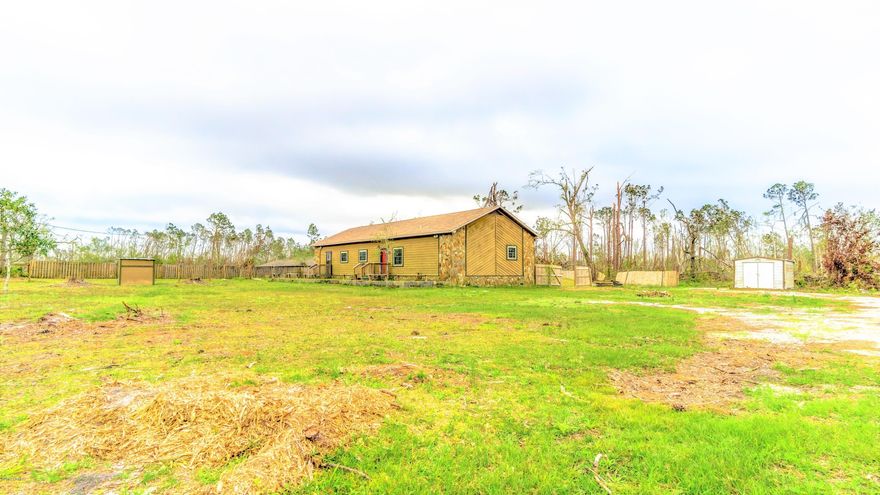 NEW PRICE! You won't find another deal like this amazing, one of a kind property! With 1,800 sq.ft, a brand new roof and more than 1.5 acres, this beautiful property is a must see. Walking in the front door you'll immediately fall in love with the hardwood floors, high ceilings and huge (25x16) living room. As you walk through your new home, you'll quickly notice how large each room is. This split bedroom floor plan also features a dining/breakfast area and a separate formal dining room. The master suite has a large walk-in closet and double vanities. (Vinyl & fence repairs will be completed)