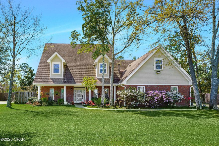 STUNNING CUSTOM HOME IN COLLEGE POINT. This spacious home offers 6 bedrooms, 4 full bathrooms, and over 3,600 square feet of living space, with main living areas that are both inviting and functional. The family room, living room, and formal dining area flow seamlessly into a beautifully updated kitchen with a breakfast nook. The kitchen has been recently renovated with granite countertops, an updated sink and faucet, new tile flooring and backsplash, along with modern lighting and a ceiling fan. Additional highlights include high ceilings, detailed trim work, fresh paint throughout, and a custom feature wall with a gas fireplace and built-ins. An interior laundry room offers added convenience with a sink, cabinetry, and counter space. The private master suite is located on the main level and features French doors that open to the back patio. The master bath includes a jetted tub, separate shower, double vanity, abundant natural light, and a large closet with a custom system. A guest bedroom and full bath are also located on the first floor. Upstairs includes 4 additional bedrooms, 2 bathrooms, new carpet, a central multi-use area (media/office/living area), and multiple attic spaces that provide excellent storage. Situated on a .46 acre lot, the property is surrounded by meticulous landscaping that includes lemon trees, blueberry bushes, crepe myrtles, and a variety of native plants. The backyard is designed for both relaxation and entertaining, featuring a large 20x30 covered and screened patio accessible through French doors from the living room. The welcoming covered front porch adds charm and is perfect for seasonal décor. This home also includes a fenced backyard, an oversized garage with a workbench, an extended driveway with space for up to six vehicles, room to park an RV or boat, a two-room storage shed, a fire pit, and raised garden beds.  In addition to kitchen and bath updates, upgrades include updated lighting and ceiling fans throughout the home (inside and out), updated Hardie board siding, fresh paint, a new water heater, and more. Tucked away on a quiet cul-de-sac in College Point, this property offers privacy and space with the added benefit of no HOA, while still being conveniently located near local amenities.  Call today for your private preview.  Measurements approximate.