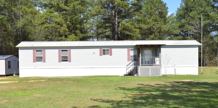 This cozy 2/2 mobile home sits on an acre lot just outside of town and features split floor plan, spacious master suite and eat-in kitchen. Outside you will find 24x36 enclosed barn with electricity and water, portable storage shed and a large back porch. Home is located near Falling Waters State Park and Orange Hill Rd.
