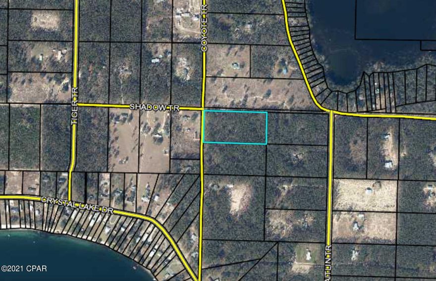 Almost 5 acre corner lot close to Crystal Lake. Build a great lake house, weekend getaway in the woods, or primary residence on this large, buildable lot. Easy access from Hay 77 and 20. Plenty of options - bring your off road vehicles and/or horses and enjoy the serene setting, away from all the traffic and noise near the beach. Utilities at street. Confirm desired land use and zoning with county.