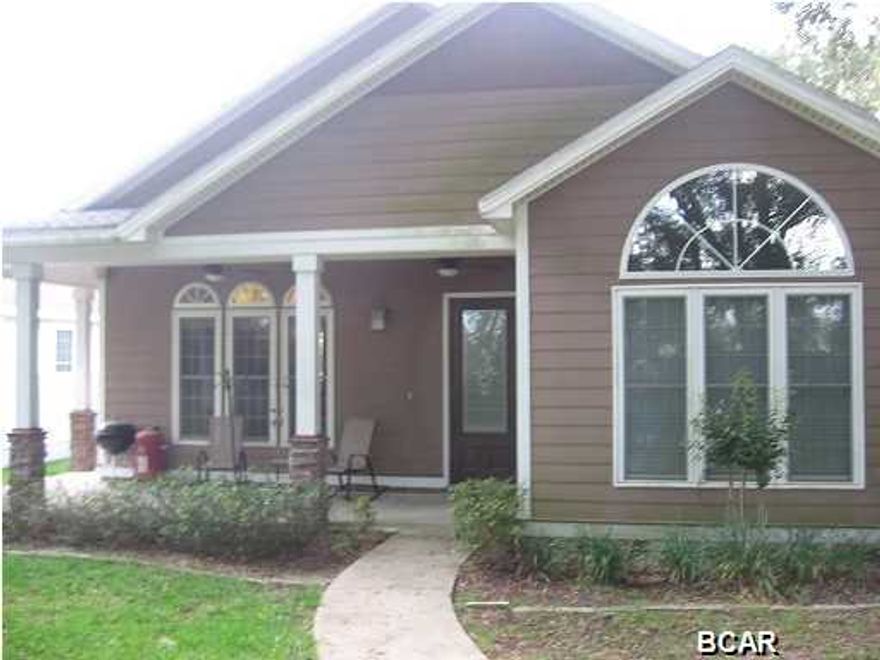 Custom-built 3/2 home in the park-like community of Riverside, with two custom pools, guest parking, playground, clubhouse, dock and fitness center. The home boasts solid mahogany doors, ceramic tile to bamboo flooring, granite countertops, an island with raised dining bar, Frigid Aire Pro Series built-in microwave, double ovens, cook top, dishwasher and sub-zero refrigerator. The Living room has a centralized custom-built remote-controlled stone fireplace/entertainment system, flanked in each corner of the room by stylish built-in bookcases/shelving. The entertainment center is connected to pre-wired Dolby 5.1 Surround Sound speakers. The large Master Suite has an illuminated tray ceiling, two walk-in closets, custom stone forms the wall of an oversized seamless-glass corner