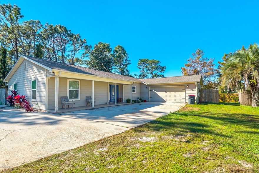 Welcome to 127 Rusty Gans Drive! Spacious 3/2 split floor plan located on a quiet cul-de-sac of Grand Lagoon Shores in the heart of Panama City Beach. Upon entering the home you are greeted with an open living area with french doors leading out to your oversized backyard. Located right off the living room is a wonderful kitchen with stainless appliances, granite countertops and ample cabinet storage. The master bedroom features adequate space and walk-in closet. Master bathroom includes garden tub and a separate tile shower. Other features include: 2 car garage, new roof in 2019, privacy fence, enclosed heated and cooled sun room.