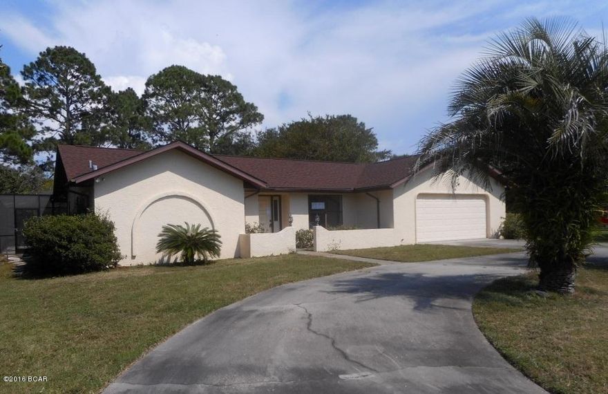 Spacious Pool Home on Canal. 4BR/4B rambler with guest suite addition. Spacious Living Room with Fireplace that opens onto pool area. Large kitchen with plenty of cabinets. The Dining Area overlooks the pool. Split bedroom floorplan. Master Bedroom opens onto pool area. It offers bath with shower only, dressing area and large walk in closet. Two Bedrooms and Full Bath at other end of home. Guest suite offers living area overlooking pool and back yard along with 4th bedroom and full bath. Inground Pool and Lanai with access from Living Room, Kitchen, and Master Bedroom.  Home sits on canal with access to bay and Gulf of Mexico. Being Sold ''AS IS''.