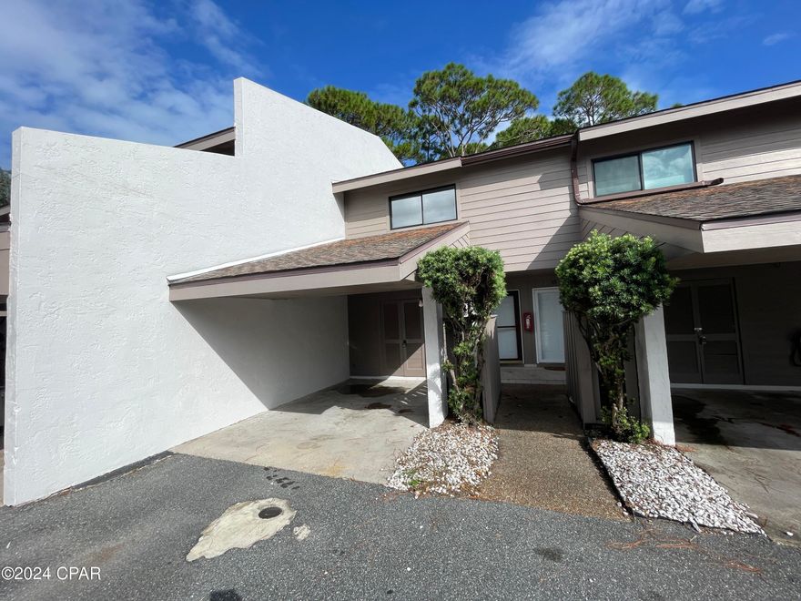 For Lease - Palisades on North Lagoon - This unit is two stories with the living/dining room, kitchen, and half bathroom downstairs and the two bedrooms each with adjoining bathroom upstairs. The kitchen features quartz counter tops, new cabinetry, refrigerator w/ ice maker, stove/oven, microwave, dishwasher, and disposal. The kitchen has a breakfast bar and overlooks the dining and living room. Going upstairs, the large master bedroom has waterfront views, large closet with mirrored sliding doors and an attached master bathroom with linen closet. Down the hall is another bedroom with double closets and an attached bathroom. The patio overlooks Grand Lagoon and is the perfect spot for grilling out! **Small pet under 24lbs negotiable with $250 pet deposit, $50 pet fee, $25 per month pet rent/pet. *Rent includes cable, water/sewer, garbage, and pest control included. Complex amenities include waterfront pool and dock. The boat dock is first-come, first-serve and may not be parked overnight.