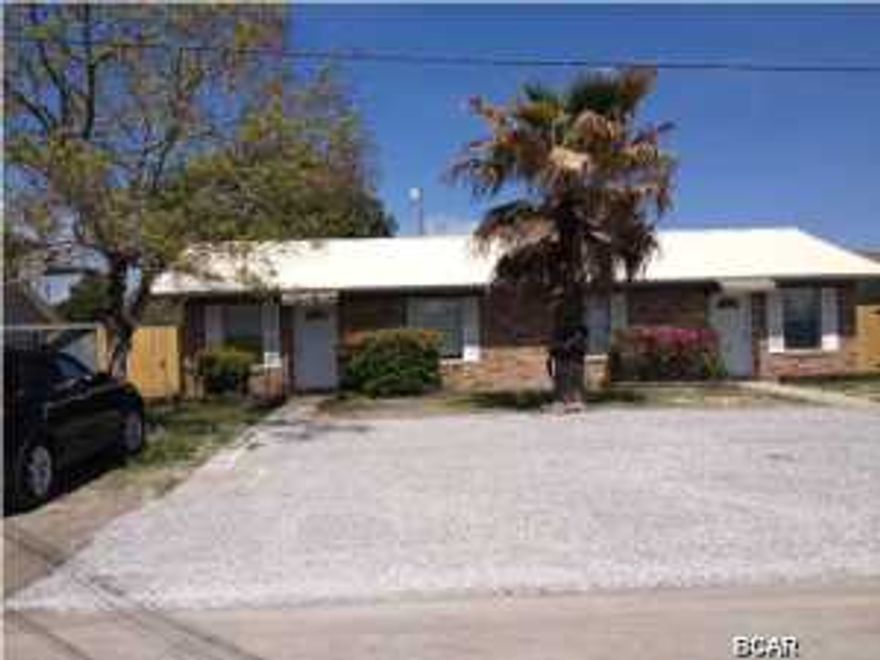 Remodeled kitchen, tile flooring, new vanity, mirror and light in bathroom, new roof. This lovely 2Br duplex is equipped with electric stove, refrigerator, dishwasher, microwave-range hood and a washer-dryer. There is a fenced backyard and a storage building for privacy and convenience. Water/sewer included up to $75.00 per month.