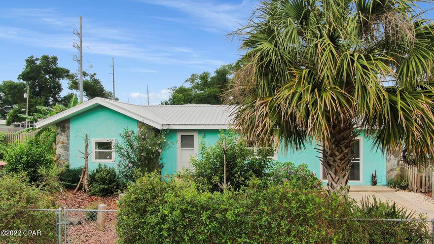 ATTENTION INVESTORS!!!!!  TURN KEY TWO bedroom plus Bonus Room house on almost 1/3 acre corner lot.   Convieniently located just 6 miles from Tyndall AFB in a quiet subdivision nestled between St Andrews Bay & Lake Martin.  The property also features a garden shed and outbuilding w/plenty of storage space.  Beautiful flowering bushes, trees and tropical plants as well as a small vegetable garden make up the landscaping and is ALL FENCED.