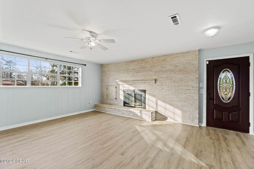 Step into the tranquility of country living with this beautifully renovated 3-bedroom, 1.5-bath brick home. Situated on a spacious 1.6 +/-acre lot, this picturesque property offers a perfect blend of classic charm and modern amenities. As you enter, you'll be greeted by the warmth of a wood-burning fireplace with brick accent wall, creating a cozy atmosphere for gatherings and relaxation. The farmhouse kitchen boasts an abundance of cabinetry, custom subway tile backsplash and two pantries for ample storage. Other inside features include an office, bonus room that could be converted to a 4th bedroom, formal dining and master suite with ½ bath. Outside you will find covered front and back porch, a 20x35 barn, numerous pecan trees and metal roof installed 2 years ago. Home is conveniently situated near the Washington/Jackson County line.