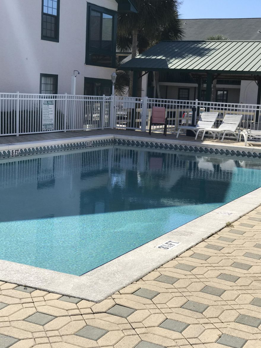 Beautiful condo in popular Greenwood Estates.

DOWNSTAIRS unit.  EVERYTHING ON 1 LEVEL.

Community pool.  Beautiful tile. New carpet in Bedrooms. Huge shower in master bath. Lots of upgrades.  Convenient to shopping and excellent location for long walks. Has a wonderful dock for fishing or to tie your boat up even though the unit does not come with a boat slip. Fenced Boat yard on premises that is available to store trailor and boat for a small fee.

This is a well maintained condo complex. This unit is a must see.