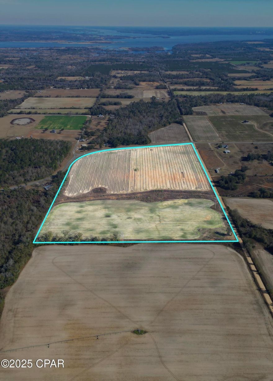 This beautiful 55 acre+/- parcel is on Sandridge Church Rd (paved with 1,750 ft of road frontage) and Nobles Rd (dirt road with 2,000 ft of road frontage). The property is all flat and not in any flood zones. It is conveniently located 5 minutes from Sneads Elementary School and Grand Ridge Schools and only 5 minutes to Lake Seminole!