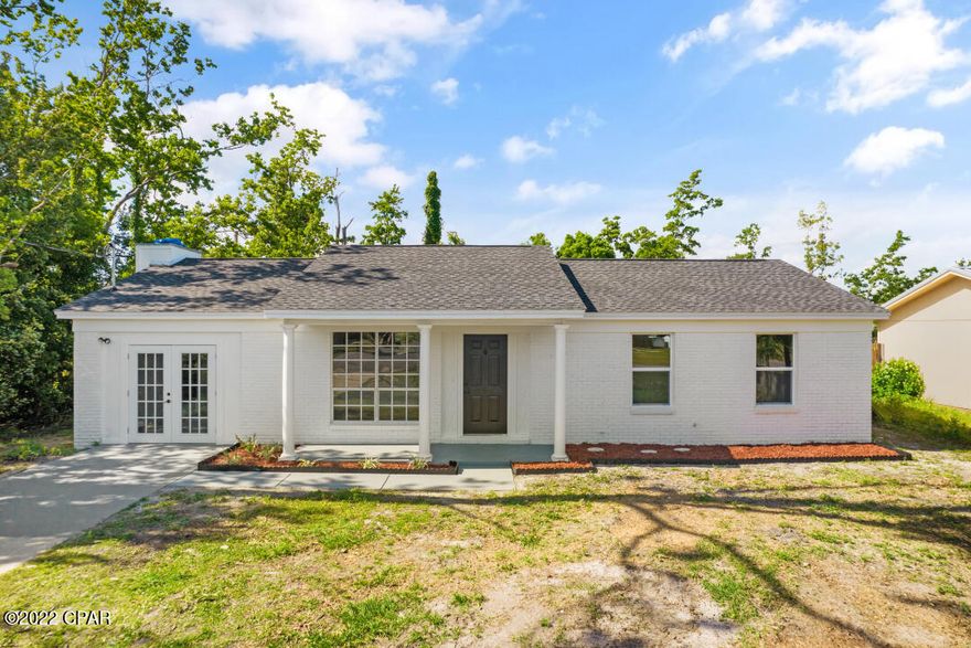 DO NOT MISS THIS ONE!  Beautifully updated 3 bedroom/ 2 bath home in the heart of Boat Race Estates.  This bright, fully re-modelled home features high end upgrades, with upgraded vinyl flooring, updated lighting, fully tiled bathrooms and a beautiful kitchen with bar seating and stainless steel appliances.  The open concept living area is incredibly spacious, and you'll love the extra features including a full pantry and half bath off the kitchen area.  Features brand new windows, roof and central AC.  Located in close proximity to Tyndall AFB, as well as many other popular shopping locations. This one will not last.