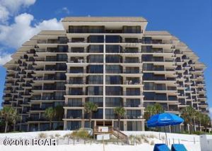 Breath taking views overlooking the Gulf and white sandy beaches.  The complete beachside of this condo is glass.  Perfect private balcony.  Very nicely furnished.  Pelican Walk is a mid-sized complex that has just received a new exterior paint job and other improvements.  All assessments have been completed and paid.  Pelican Walk has so much to offer such as two pools (one heated), tennis court, handball court, game room, hot tub and more!  Much sought out area of Thomas Drive.