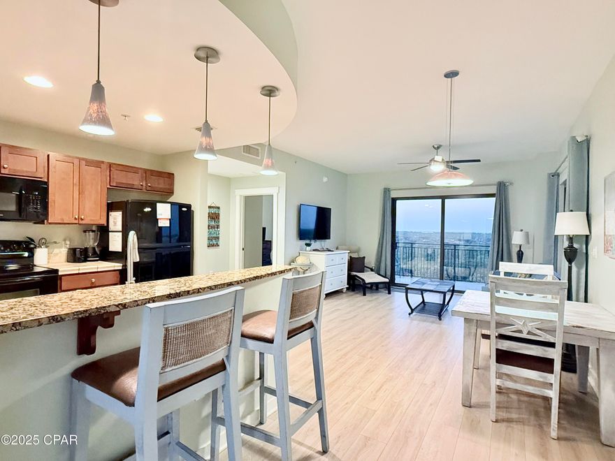 Here's your chance to own a 2 bed, 2 bath lockout condo at Origin!  Lockout units are rare in PCB, and rarely do they come up for sale.  Unit 1019/1021 is being offered fully furnished and rental ready!  Unit 1019 is a 562 sqft studio unit complete with it's own kitchenette, HVAC unit, water heater, private balcony, and sleeps 4.  Unit 1021 is a 877 sqft  1 bed, 1 bath unit with a full kitchen, HVAC and water heater, stackable washer and dryer, a large private balcony with Gulf views, and sleeps an additional 4 people.  Both units have been renovated together making the flow through the lockout doors seamless.  There is no carpet in either unit, just beautiful LVP flooring and ceramic tile.  Recent renovations include new lighting, new paint, new drapes throughout, upgraded washer and dryer, smart thermostat, several new pieces of furniture, a new dishwasher, 2 recently replace hot water heaters, and new decor.  From the moment you walk in either unit, you are welcomed with the subtle beach tones and relaxing vibes!  These lockout units are a great way to acquire your dream of beach property while getting 2 units for less than each separately.  Studio units in Origin are asking in the low 200's currently, and 1 bed units are asking around $300k.  With a combined value of over $500k, units 1019 and 1021 can be had together for well under those values!  Additionally,  your options are endless.  You can rent both units on the short term rental market as individual rentals, rent them together as one large unit, live in one and rent the other, or simply live in both and have the much needed space for guests, a home office, a roommate, or any other configuration you can dream up.  There are Gulf views in unit 1021 from the living room window, and from the balcony.  The county pier is well within sight, giving you a great place to watch the many displays of holiday fireworks over the Gulf.  Both 1019 and 1021 also have views of West bay from the living areas and balconies.  There is a deeded beach access just across Front Beach Road, and within walking distance to a multitude of beachfront bars, restaurants, entertainment, Pier Park, and Top Golf.  Origin offers many amenities including two BBQ grill/picnic areas, a heated pool, hot tub, theater, game room, laundry facility, vending, a gated community with 24-hour security, and a Sunsations beach store located on the ground level. Origin is also one of the only high-rise condos on the beach that offers interior corridors that will keep you out of any inclement weather.  The seller is motivated, so give me a call today to schedule your private viewing and make your dreams a reality with your own piece of paradise!