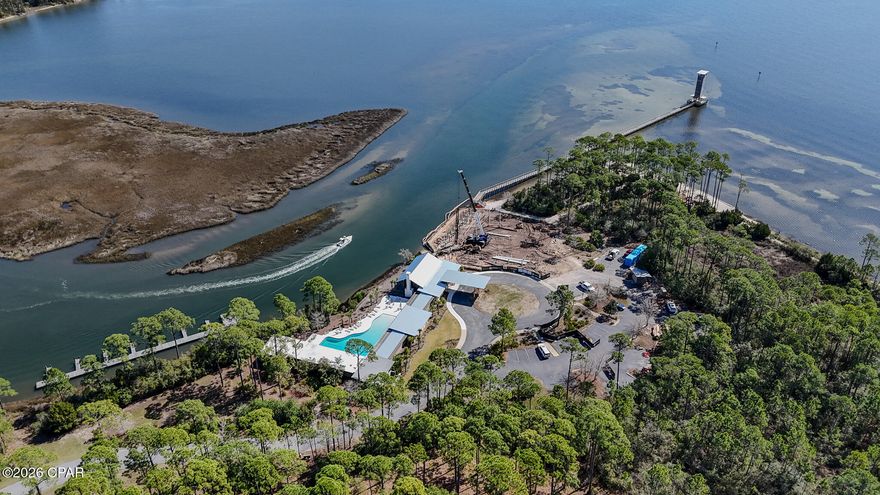 Build your dream home in one of Northwest Florida's most desirable gated waterfront communities. This beautiful vacant homesite is ideally positioned on a quiet cul-de-sac in the serene and tranquil RiverCamps on Crooked Creek, offering privacy, natural beauty, and exceptional access to the water.

RiverCamps is a thoughtfully designed, amenity-rich community surrounded by protected conservation land and scenic waterways. Residents enjoy a gated entrance, stunning waterfront pool and clubhouse, pool pavilion, miles of boardwalks and nature trails, private boat launch, boat wash station, campground, and RV/boat parking. Spend your days exploring the water with community kayaks and paddleboards, fishing from the docks, or enjoying breathtaking sunsets over Crooked Creek.

For boating enthusiasts, RiverCamps provides deep water access leading directly to the Intracoastal Waterway and the Gulf of America, making it easy to enjoy world-class fishing, boating, and waterfront dining.

Despite its peaceful, nature-filled setting, the community is conveniently located just minutes from the white-sand beaches of Panama City Beach, Northwest Florida Beaches International Airport (ECP), 30 Avenue, shopping, dining, and entertainment.

If you're looking for a rare opportunity to build in a private, waterfront-focused community that blends luxury living with untouched natural beauty, this exceptional cul-de-sac lot in RiverCamps on Crooked Creek is the perfect place to start.