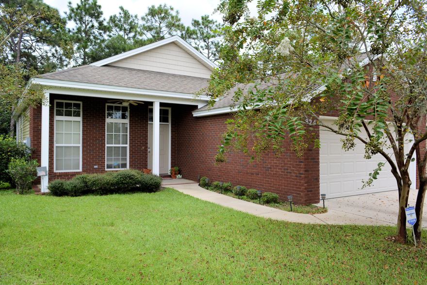 Great first time home buyer opportunity in one of Lynn Haven's best little subdivisions. This home features an inviting front porch and peaceful rear covered patio, beautifully maintained yard, and impressive brick/vinyl exterior. You'll appreciate the large living room that adjoins a dining area and an open kitchen. This split bedroom plan offers two spacious guest bedrooms with an adjoining bath. The large master bedroom suite is situated to the rear of the home offering privacy and a very well appointed bathroom. This home is conveniently located close to shopping, the area's best schools and only 25 minutes drive to either military base. Don't let this awesome home get away, so schedule your appointment to see it today! All sizes taken from public record, please measure to be sure.