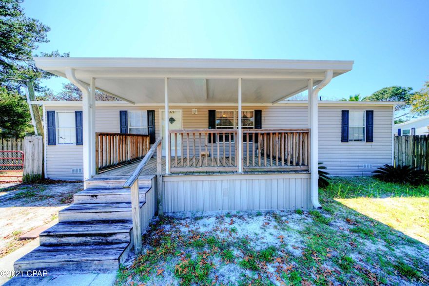 4 bedroom, 2 bath mobile home on the West end of PCB! This home is just a short drive to the white sandy beaches, Pier Park and the high-desired ''30A'' community. This home is welcoming with a covered front porch. The living room is spacious and leads to the eat-in kitchen. The kitchen is equipped with white appliances, a dining area and lots of cabinets for storage space. There is also a laundry area off the kitchen. This whole features a split bedroom floor plan offering plenty of peace and privacy. The spacious master bedroom boasts a private ensuite. The master bathroom is equipped with a shower/tub combo. The three additional bedrooms share a full guest bathroom also with a shower/tub combo. The large backyard is secured with a privacy fence and features a covered patio, storage shed and carport. The backyard is the perfect spot to enjoy the Florida sunsets with family and friends.