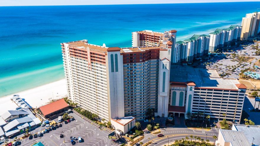 Great 2 bedroom/3 bath unit with bunks on lower floor. Includes Deeded parking spot on the 10th floor, park your car and walk to unit, no elevators needed. Shores of Panama offers resort style amenities including 14,000 SF Gulf side pool and hot tub, large heated indoor pool & hot tub, health and fitness center, sauna, massage therapy and steam room, 2 tiki bars serving lunch and dinner, also Donut, coffee and ice cream shop, pizza parlor, meeting spaces, covered parking deck.