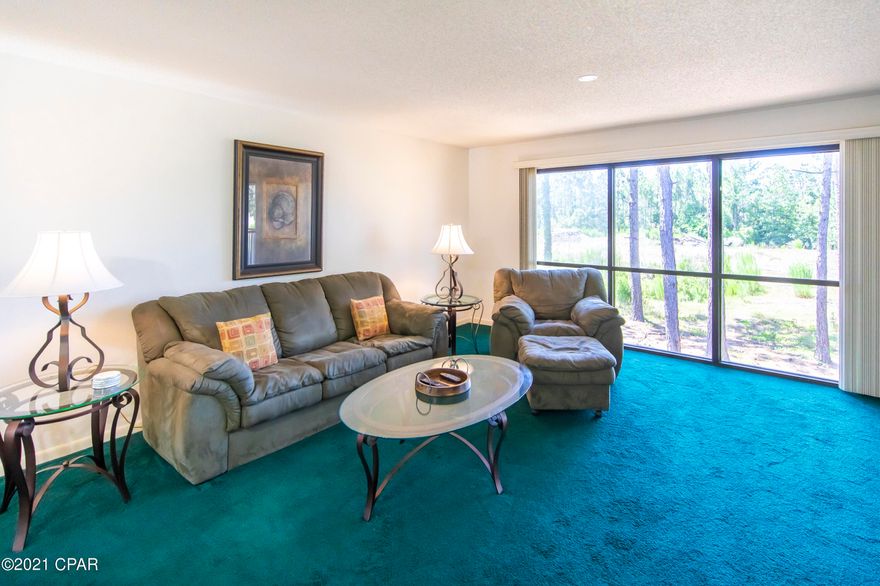 UNDER CONTRACT WITH CONTINGENCY, SELLER ACCEPTING BACKUP OFFERS.

Fully furnished, two bedroom, two bathroom, 1370 square foot (upstairs) condominium located in low-density Hombre Golf Village. Unit 14 just sold for $199,900 - so this unit is a deal at $184,900!  Hombre Golf Village has a master plan for commercial shops and a Duplin Winery.  This is an opportunity to own in up-and-coming Hombre Golf Village  and catch Hombre Golf Village in an upswing and maximize one's investment.

Unit 12 at Hombre Golf Village is an immaculately maintained condo with two master suites and two full bathrooms.  What makes this condo truly unique is the fact that each master bedroom has it's own private balcony and bathroom. The living room / dining room combo is very large, 24 feet x 14 feet, and has a floor to ceiling window and balcony access.
The kitchen is a chef's dream with oversized pantry, breakfast bar, and washer and dryer (in separate closet).
This unit has a newer HVAC.  This unit has a pool right beside the building. The complex is easy walking distance to shopping, restaurants, gift shops, retail stores, banks, grocery stores, and fast food restaurants.