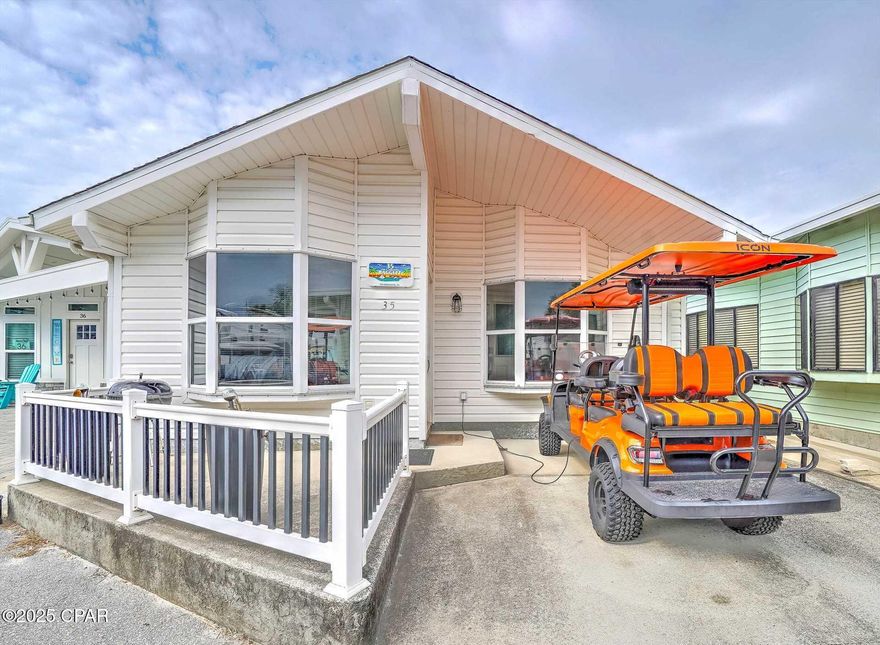 Rare opportunity to own in highly sought-after Venture Out. This beautiful 3 bedroom, 2 bath has a great open floor plan and flows beautifully! The kitchen is large and open to the living room. The home has new paint, flooring, granite, backsplash and more. This home looks and feel like new! The location is premium as you have extra parking in the back of the home. Venture Out is a golf cart community that has exploded with popularity recently. With 300' on the beautiful pristine beaches of the Gulf of Mexico and 1,000' on the Gulf!