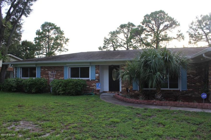 BACK ON MARKET BEAUTIFUL Brick Ranch totally remodeled 3 bedrooms and 2 baths, a formal living room and separate family room, a formal dining room, a large kitchen with custom cabinets and granite counter tops, an over sized laundry and mud room This lovely home has the crown molding, new tile and laminate flooring, new windows throughout and other great finishes. Other features include, hurricane shutters, a nice 20x40 saltwater pool, the pool deck was resurfaced in 2014 and the pool was resurfaced in 2013. New pool pump 2015, detached heated and cooled space perfect for your office. A large 2 car garage, beautiful outdoor lighting and well manicured completely fenced back yard add to this great home. This home will not last, better see it today. If measurements are important, please veri