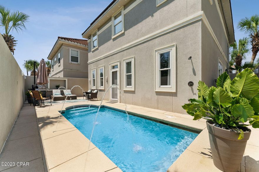 UNDER CONTRACT ACCEPTING BACK UP OFFERS Welcome to your dream home in the sought-after Calusa Bay neighborhood! This stunning 3-bedroom 3.5 bath residence is a true gem, offering an open floor plan. The beauty of this home is further accentuated by the elegant granite countertops and the rich charm of hardwood flooring upstairs and tile on the first floor. As you step outside, you'll find yourself in your very own backyard oasis. Unwind and bask in the serenity of your private pool, and outdoor shower perfect for refreshing dips on warm summer days. There's a versatile flex room that can effortlessly transform into a home office. Alternatively, it can easily convert into a comfortable fourth bedroom. Beyond the comfort and amenities of your home, you'll find easy access to the beach, fantastic dining and golf courses.