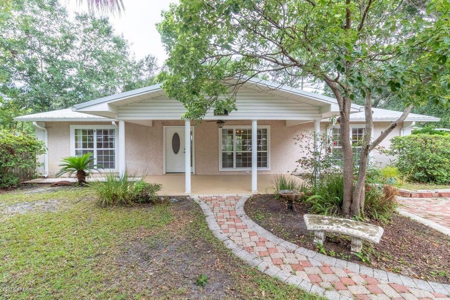 Great house!!! Large corner lot. This home has undergone many renovations, including a metal roof, updated flooring, new paint, windows (2003), A/C (2006). Kitchen includes double oven, new microwave, nice cook top stove, and corian counter tops. There is a 4th (bonus) room with french doors that would make a great office, playroom, or even bedroom. Large master bedroom, w/private bathroom and three closets! Large laundry room. The covered patios in the front and back of the home make for great areas to entertain! Shed outback for extra storage, and backyard has a privacy fence. The seller is offering a $1,200 carpet allowance, and $500.00 home warranty with an acceptable offer. Termite bond to transfer to new owner. Sizes and measurements taken from tax records. Must see!