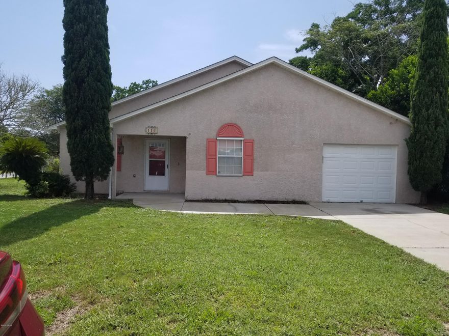 BACK ON MARKET... All inspections completed. NEW HVAC system installed. Buyers financing fell through... Age, Sq. Ft., Lot Size, all dimensions are approx. This low maintenance home is centrally located   on a large corner lot and is walking distance to the Beach. There is plenty of room to add a pool. The kitchen has a breakfast bar, all appliances, and is flanked on one side by a breakfast room and the other by a dining area. The dining room could be used as a home office, play room, craft room, etc.  Freshly painted. An enclosed sun room is on the rear of the home and provides a great private area for the home owner or a nice place to gather with the family and friends and enjoy an outing in the privacy fenced backyard.  One Car garage and 3 beds and 2 baths complete this home.