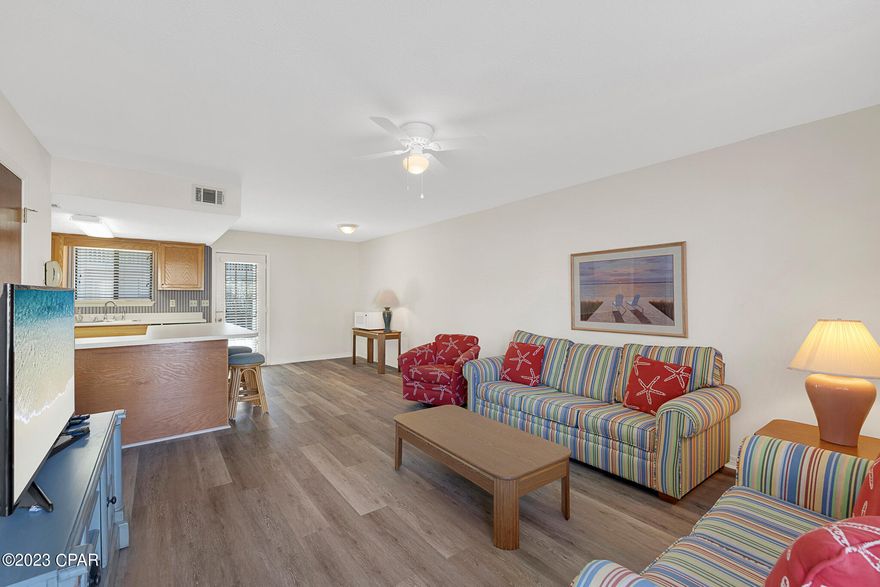 Located near the HEATED POOL, exercise room and the tennis court, walking distance to the dedicated access on Front Beach Road, making easy access to the beach and the Clubhouse. This well-maintained unit in Gulf Highlands Beach Resort has never been rented and only been used by its original owner and family. This 2-bedrooms/1.5-bath townhouse makes for a great short term rental property in Panama City Beach, Florida. The unit conveys fully furnished and rental ready and it can easily accommodates 6 to 8-guests. Living room has brand new LVP flooring, and seller just got a brand new dishwasher installed. There's a full bathroom upstairs, however, an additional full bathroom can be easily installed in the area the previous water heater tank used to be since a tankless water heater has been installed. The back patio comes with the concrete patio furniture, so you don't have to worry about flying around during Florida pesky weather. The seller is providing a recent 4-point and wind mitigation report recently done for insurance purposes. Located on Flood zone X, no flood insurance is required, Roof is 10-years, HVAC is 11-years old. Low HOA fees, Long and Short-Term Rentals allowed. Gulf Highlands Beach Resort is a gated community with 11 swimming pools (5 heated), 4 tennis courts, a 2-acre putt-putt golf course, shuffleboard courts and Clubhouse with a pool on the beach. All measurements are deemed correct, buyers should verify if they are important.