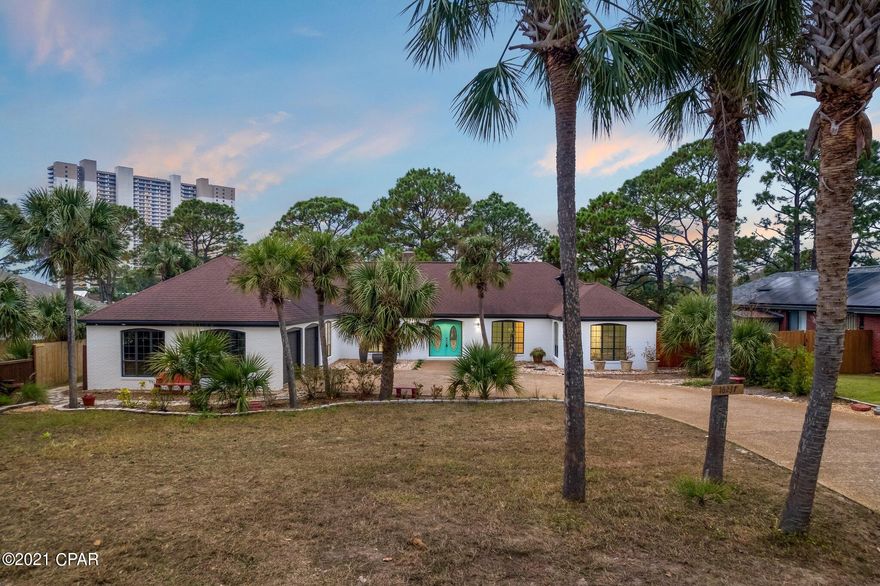 Under Contract - Taking Backups the phrase 'CURRENTLY UNDER CONTRACT, SELLER ACCEPTING BACKUP OFFERS' to your NEW BEACH HOME. This remarkable family home with 4 bedrooms and 3 baths is completely renovated and located in a quiet neighborhood. It is close to Pier Park, Frank Brown Park, Shopping, Grocery stores and many Favorite Local Restaurants, 30A and much more! This waterfront property is located on Lullwater Lake and just a 3 minute drive to The World's Most Beautiful Beaches. Some of the highlights of this home include a open concept kitchen, a double sided fireplace, split floor-plan, walk-in closets, a large mud room off of the 2 car garage with workshop cabinets, a designated fire pit area and a oversized driveway. You can walk outside from one of the 3 sets of French doors locate This is the perfect place to entertain your guests, watch the kids play, have some cocktails and watch the gorgeous sunsets. All info is approx. and must be verified by Buyers if important.