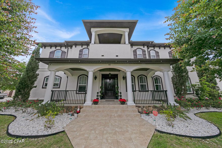 MAGNIFICENT custom built home in Tapestry Park! Stepping through your grand entrance, you are welcomed with beautiful oak front doors, gorgeous hardwood flooring, Italian tile, elegant columns & arches! The glamour throughout takes your breath away. The dramatic staircase leads to your master suite with an unbelievable master bath, plus 2 additional bedrooms with private baths. Downstairs is a guest bedroom/office also with private bath. The kitchen is exquisite! The oversized island is so stunning, it also takes your breath away! Open the automatic curtains & your backyard oasis appears. The pool, hot tub, along with custom stone fountain! Pass the sauna is the guest quarters. Back inside notice the crystal chandeliers, numerous fireplaces, double oven, wine frig, the list goes on & on.