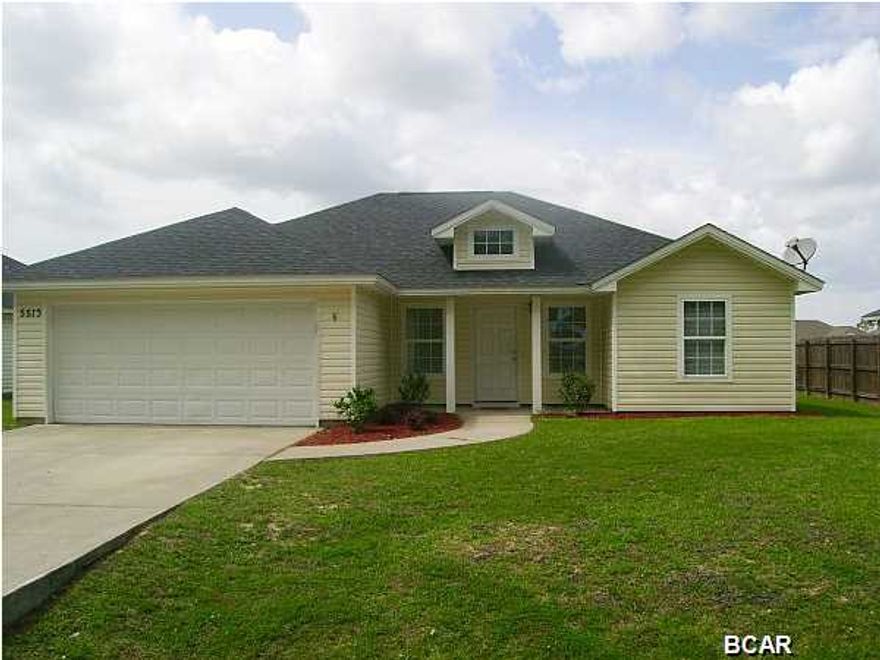 Great home in great location with ceramic tile and carpet, open floor plan, breakfast bar, tray ceiling in master bedroom, split bedroom plan, 2-car garage, and sprinkler system.