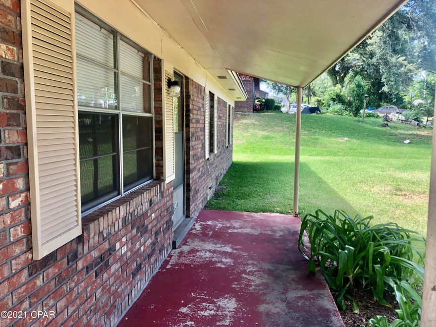 CURRENTLY UNDER CONTRACT, SELLER ACCEPTING BACKUP OFFERS --Affordable Brick Home on Paved street convenient to most everything Marianna has to offer.  Home comes with 3 bedrooms, 1 bath, 1 car carport to keep you out of the weather, newer metal roof, large concrete driveway, with granddaddy size oak for plenty of shade. Home is clean and move in ready.  Why rent when you can own your own home. Make an appt. today.