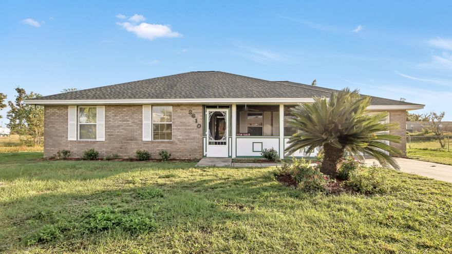 *Home is back on the market b/c buyers financing fell through* This 3 bedroom 2 bath brick home sits on over a half acre lot. The home is partially fenced in and backs up to a peaceful pond. The home features a new roof (2019), new air compressor in 2000, new insulation, new ceilings, window screens, new carpet in living rooms, and more! The homes front porch is screened in and the front yard has been newly landscaped. The home also has a Green Machine Roof Solar Vent. The home offers a lot of storage and is move in ready! The home is zoned for mixed use/ Residential and Commercial.