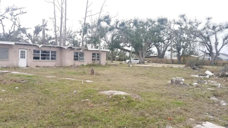 84 Frontage ft. on S. 22A.

 A structure is on the property-House-needs total rehab.

Utilities not presently hooked up to structure, though available. Has city water and sewer.

According to the City Of Parker: Zoning is 

(Mixed use 1)

Public water/sewer.