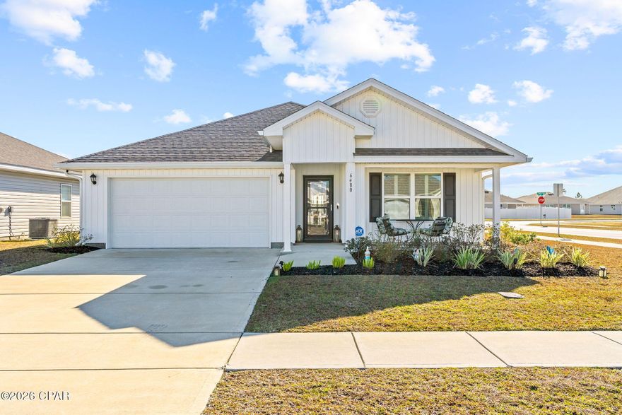 Welcome to 6480 Slabinski, a turnkey home located steps from the clubhouse in Phase 2 of the highly desirable Liberty community. Situated on a spacious corner lot, this beautifully maintained Cali floorplan offers comfort, upgrades, and convenience without the wait of new construction.

The kitchen is functional and inviting, featuring a large center island, white cabinetry, an upgraded single-basin sink and faucet, laminate countertops, stainless-steel appliances, and over-island lighting ideal for everyday living and entertaining.

This home is thoughtfully upgraded throughout, including blackout plantation shutters, ceiling fans in every room, a storm door, and a screened-in patio overlooking a vinyl-fenced backyard with two gates. Additional features include gutters and a reverse osmosis system providing purified water and ice.

Enjoy added peace of mind with a Ring security system with front and rear cameras, a renewed Sentricon termite bond, and an HVAC system enhanced for bacteria and odor reduction. 

Liberty offers exceptional community amenities. Basketball court and a Pickleball court, sidewalks throughout with water fountains, two pools, a splash pad, two playgrounds, and a 7,500 sq ft clubhouse featuring a gym,kids room, yoga/ Pilates and two outdoor kitchen. Ideally located near Tyndall AFB, beautiful local beaches, and just minutes from the new shopping center by Publix and Starbucks.