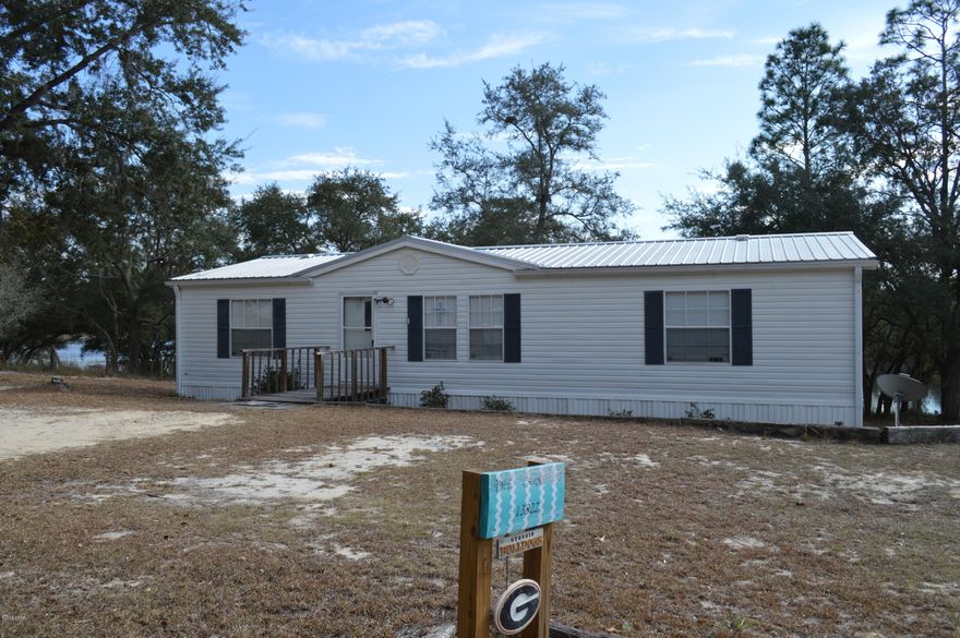 BEAUTIFUL WATERFRONT on sparkling spring fed Brit Pond!!!  You will not find this kind of steal on such an adorable home with acreage on any other Sand Hills lakes.  The perfect place to raise a family, have as a getaway or to retire and enjoy the serenity and wildlife.  Bald Eagles, Herons, Kites as well as plenty more birds and other animals to enjoy in their natural habitat.  Plenty of room for your outdoor hobbies; enjoy fishing, kayaking/paddleboarding and swimming right out your own back door. You do not want to let this one get away!