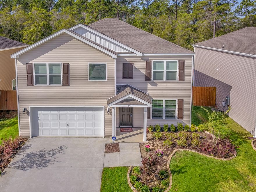 This popular Hayden floorplan features 5 bedrooms, 3 baths PLUS a office/den/formal dining and a loft/den! The kitchen with large pantry and stainless steel appliances is open to the living room and dining area. There is 1 bedroom downstairs and a full bath. Upstairs is the master suite with bathroom with double vanity, separate tub, separate shower, and huge walk in closet. There are 3 more bedrooms and a full bath upstairs along with a loft/den. Privacy fenced backyard overlooking woods.All sizes/measurements/info approx, please verify if important.