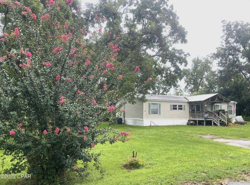 Looking for a nice home on a beautiful oversized lot in the heart of Malone? Look no further! This double wide manufactured home sits on 6 city lots which features a lush lawn and array of serene mature trees. The home has a large covered front porch perfect for taking in everything nature has to offer. Upon entering the home, you are welcomed by the kitchen and dining area to the left and large open living room area straight ahead. This home boasts a split floor plan with the master bedroom and bathroom located off the living room to the right and the 2 other bedrooms, full bathroom and laundry room located down the hall to the left. Washer and dryer convey with the home! Don't sit on this one it won't last long!