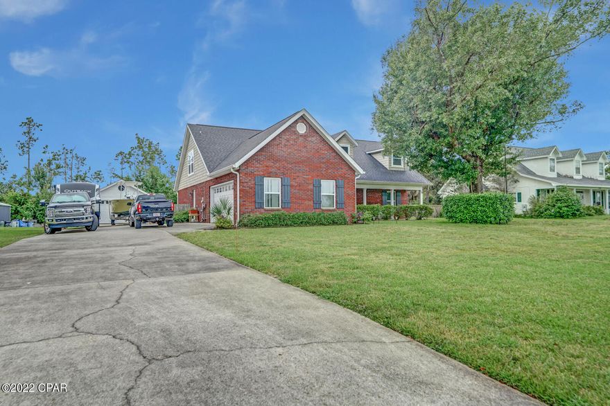 CURRENTLY UNDER CONTRACT, SELLER WILL CONSIDER BACKUP OFFERS. Take a look at this beautiful brick home with 5 bedrooms, 3 full bathrooms and an in-ground pool, just North of the Nature Walk Golf Club. This well-maintained home is situated on a quiet street on nearly a half-acre lot. A concrete driveway leads to the attached 2 car garage and an additional detached garage at the end of the driveway. Enter through the front door to be welcomed by the large living room ahead, a formal dining area to the left and a bedroom/office to the right. The living room fireplace, tall ceilings and premium flooring throughout. Down the hall, a large master to the left and a third bedroom and guest bath to your right. The master bedroom offers a walk-in closet with built in organizer and a master bathroom with double vanity, and walk-in shower. A breakfast nook separates the kitchen from the living area. In the kitchen you'll find plenty of storage and counter space, tile flooring, updated appliances and backsplash. Upstairs, the fourth and fifth bedroom are separated by another living area. Each upstairs bedroom has plenty of closet space and a third bathroom! Out the back door you can enjoy the large partially covered patio and a relaxing in-ground saltwater pool. An additional storage shed is in the back yard. The pool yard is fully fenced in with a gate opening to the driveway for easy access to the garages. Both garages feature concrete floors and automatic garage doors. New roof and Two New AC units in 2019. Water Heater replaced a few months ago. There is so much to love about this home, you'll want to see this one for yourself. Call your favorite realtor and schedule a private showing today! 

All measurements are approximate. Buyer to verify if important.