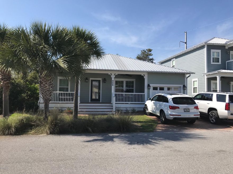 Premier location on the West end of Panama City Beach - short drive to Walton County and 30A, and a short drive to the Pier Park area.  This 3 bedroom 2 bath Florida cottage style home is tucked back in a secluded small subdivision with a community pool.  This home features a split bedroom plan with open kitchen/dining/living room areas, 1 car garage, and a fantastic outdoor deck and kitchen area for entertaining.