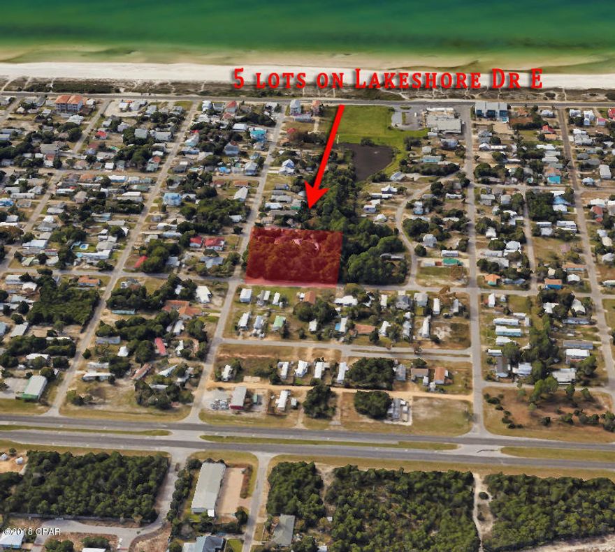 This listing is for FIVE 50' LOTS IN LAGUNA BEACH.  Lakeshore Dr. E. is a straight-shot street from Back Beach Road to Front Beach Road RIGHT IN THE MIDDLE OF THE LAGUNA BEACH DEDICATED BEACH.  Very close to Thomas Donuts and Carousel Market.  This listing includes two parcels (Parcel ID: 	37364-020-000 and 37364-000-000).   ALMOST .75 ACRES.  Lot 26 is 50x210 and it includes a 10' deep pool.  Lot 27 is 50x210.  Lot 28 is 50x130.  Lot 29 is 50x90.  Lot 30 is the corner and it is 50x80 (all sizes are approximate).    Seller will not divide.